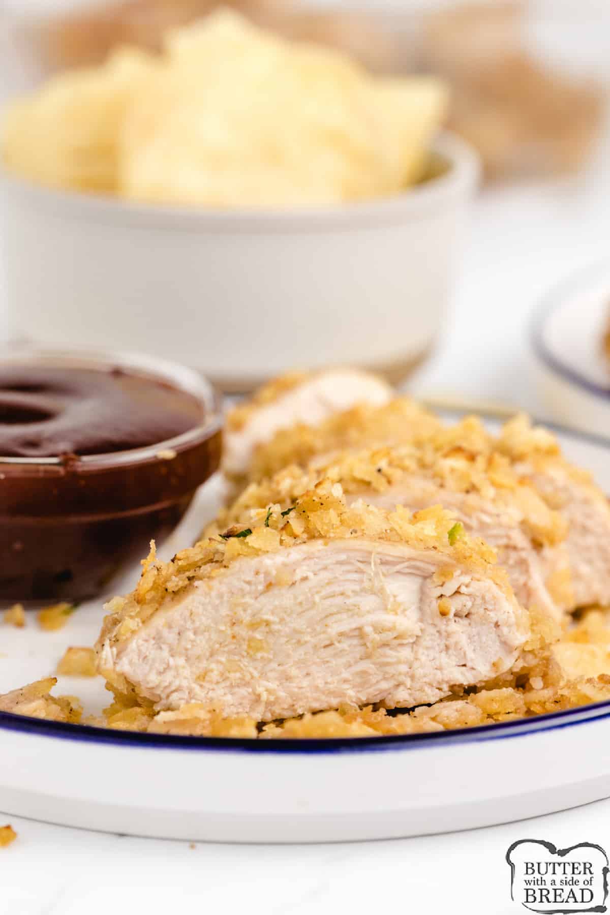 Chicken breasts coated in crushed Lays potato chips