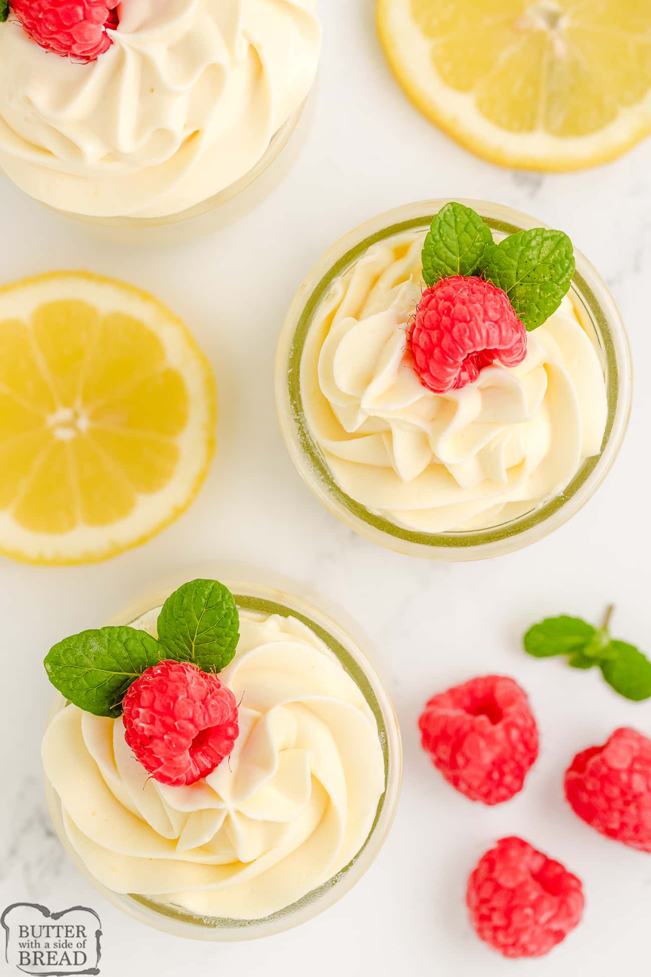 easy lemon mousse topped with raspberries