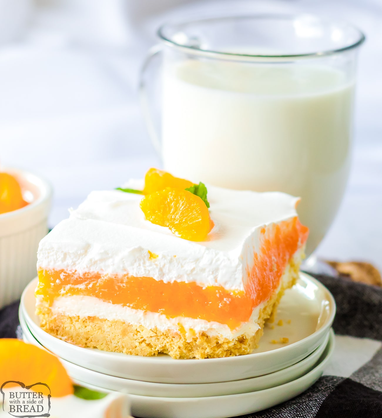 square of orange creamsicle lush dessert with milk