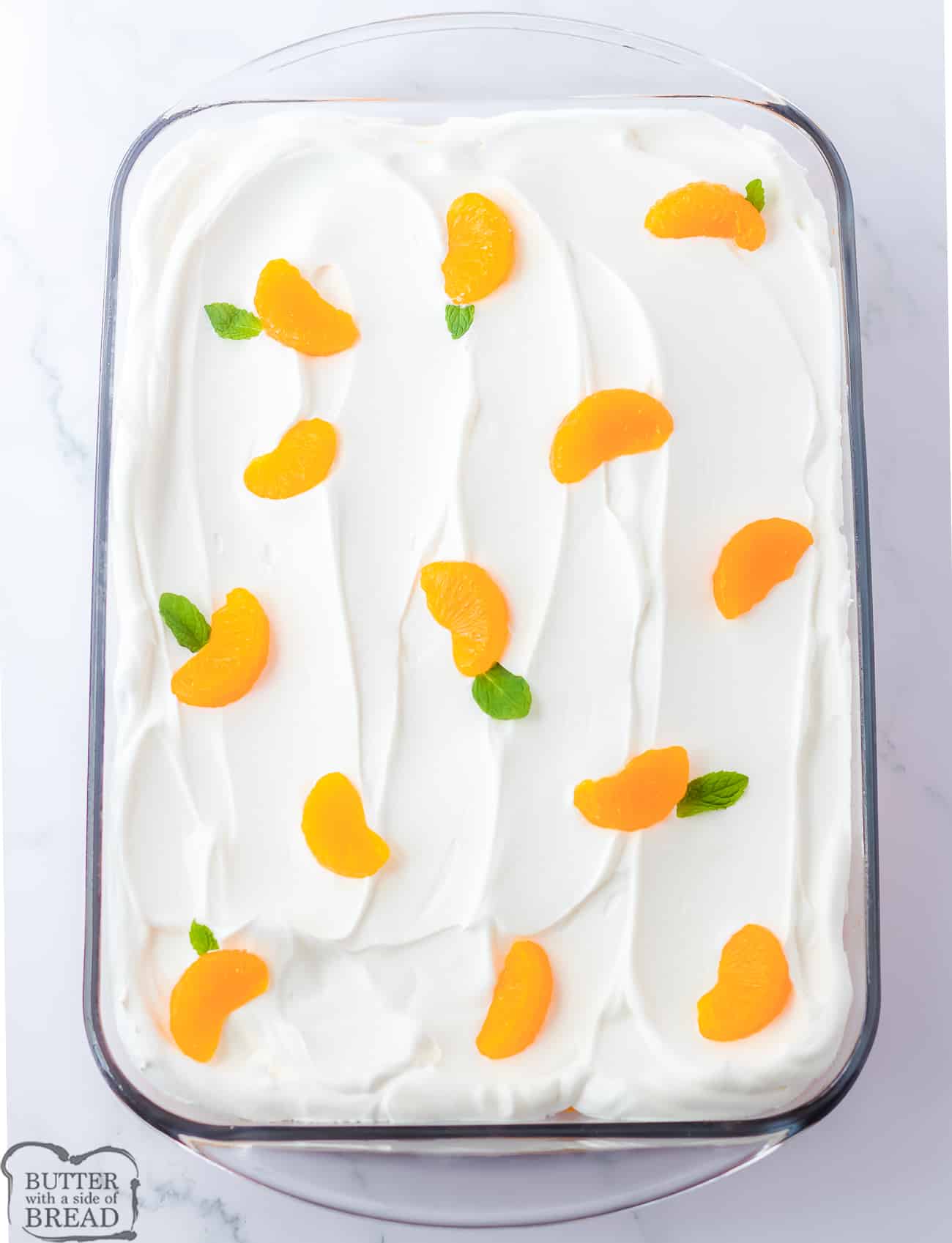 pan of orange lush dessert creamsicle cake