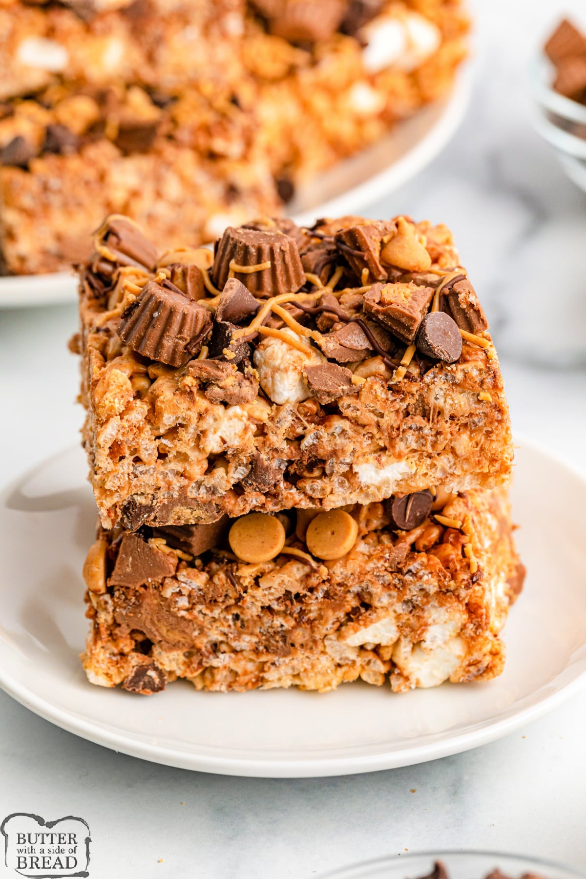 Reese's Rice Krispie Treats are loaded with mini Reese’s peanut butter cups, peanut butter chips, and semisweet chocolate chips. Simple rice krispie treat recipe packed with chocolate and peanut butter!