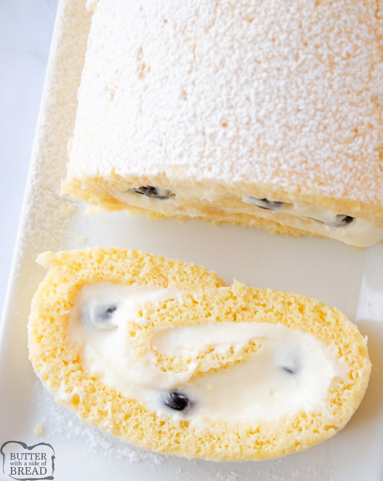 easy lemon cake roll with blueberries