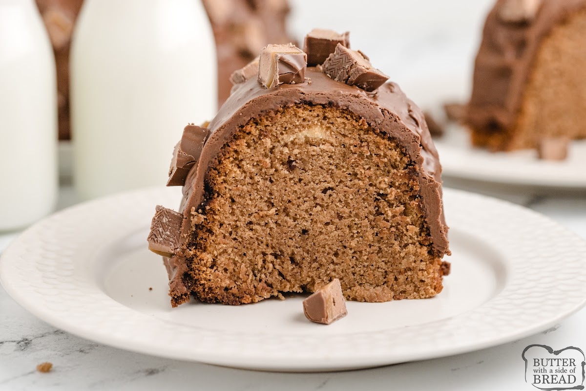Milky Way Cake is a rich, moist bundt cake made with melted candy bars and topped with chocolate-marshmallow frosting. Crowd favorite!