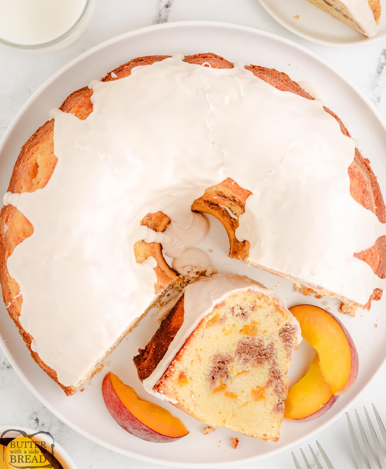 peach cobbler pound cake with a slice cut out