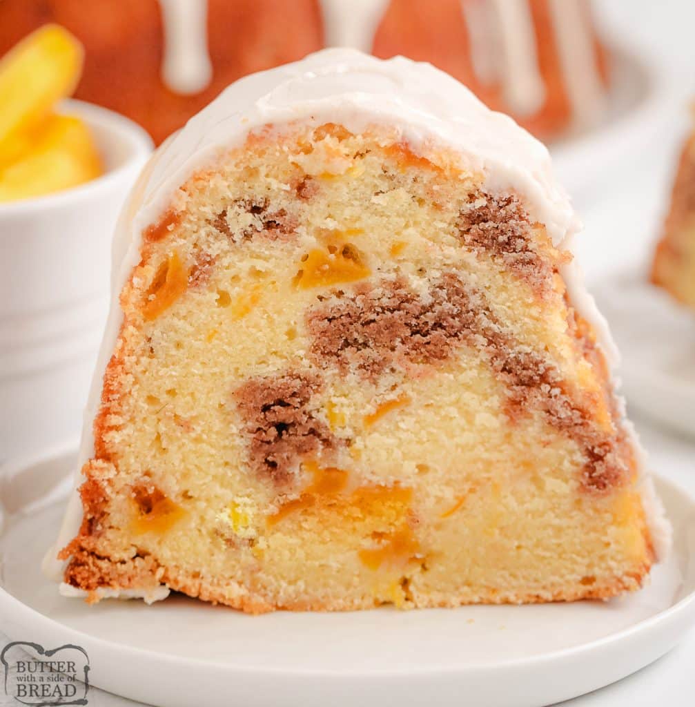 slice of peach pound cake with brown sugar crumble inside
