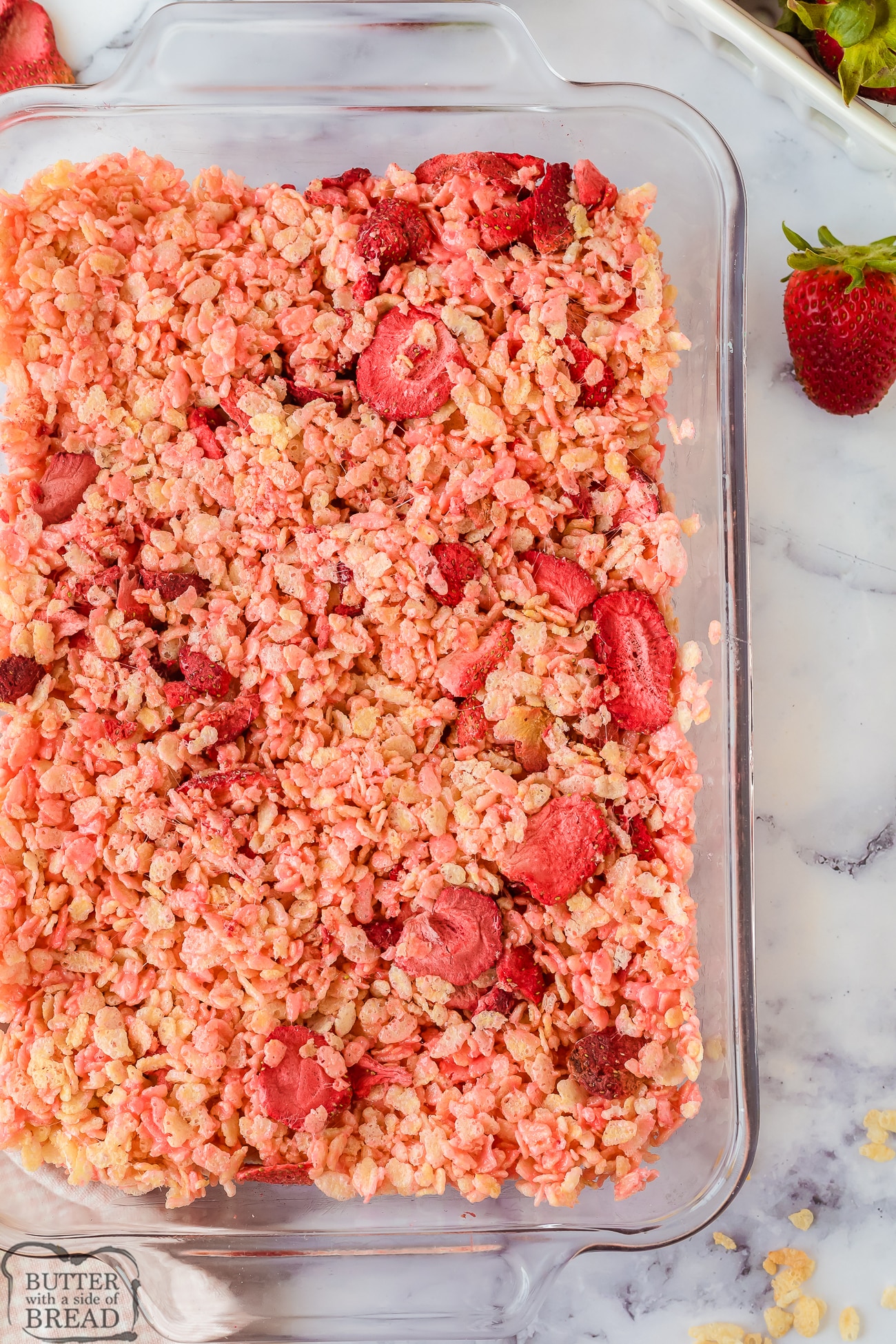 strawberry krispie treats in a pan