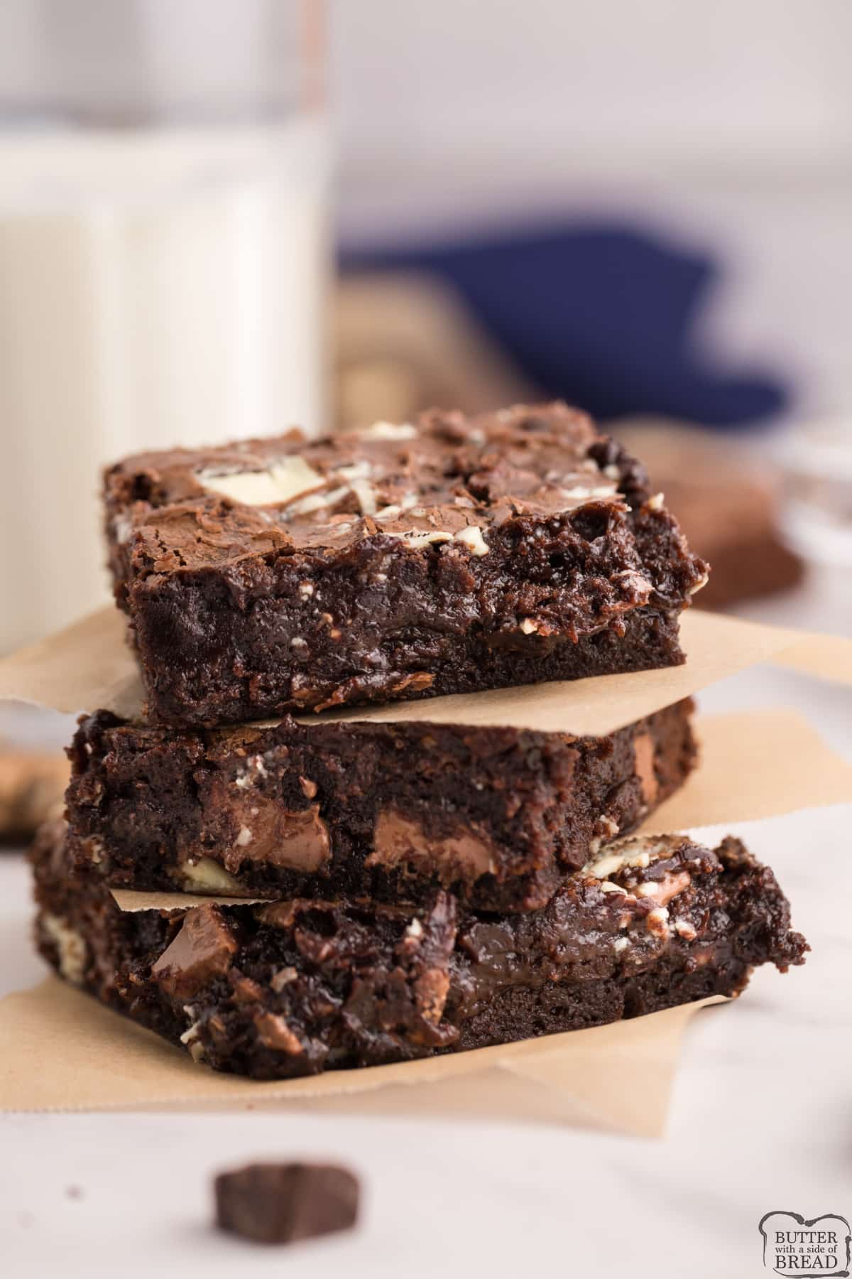Triple Chocolate Brownies are made with melted semi-sweet chocolate and chunks of milk chocolate and white chocolate. The perfect brownie recipe for chocolate lovers!