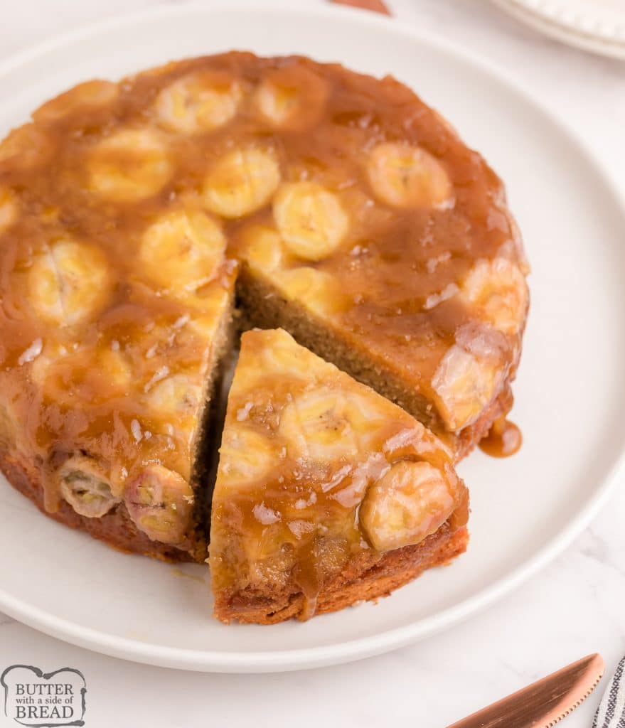 upside down banana cake with a slice cut out