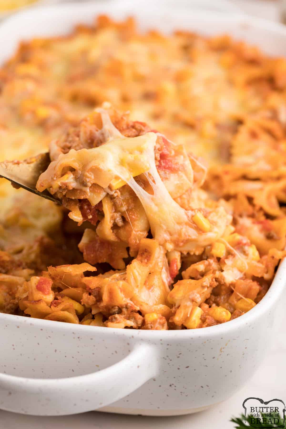 Sloppy Joe Casserole made with pasta coated in a ground beef, tomato and cheese based sauce, topped with yet more cheese and baked to perfection.  Easy weeknight dinner recipe that the whole family will enjoy! 