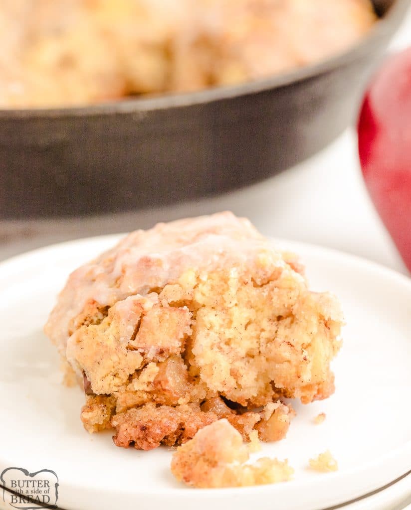apple cinnamon biscuits with vanilla glaze on a plate