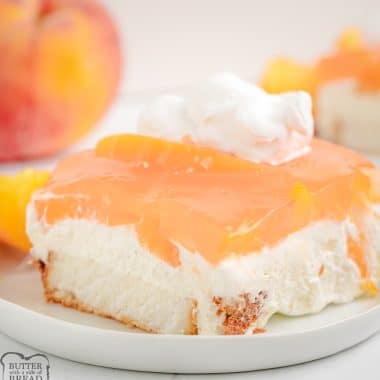 peaches and cream jello angel food cake dessert square on a plate
