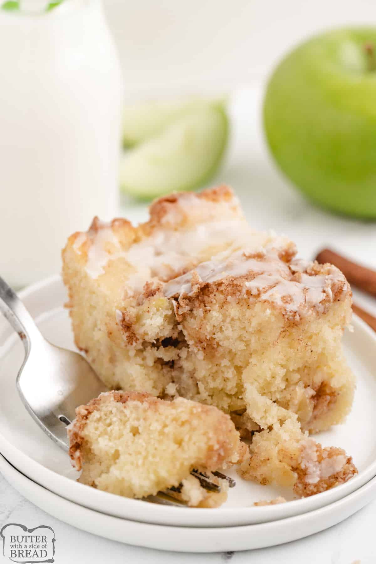 Apple Fritter Cake tastes like your favorite apple donut in cake form! Delicious apple cake recipe made completely from scratch.