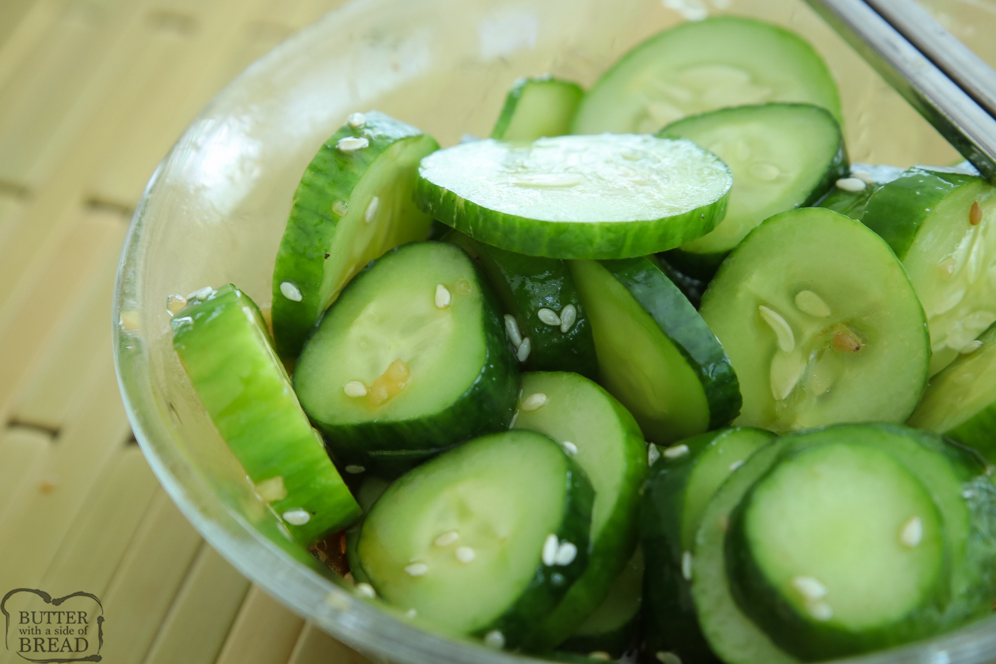 bowl of cucumbers with a soy sauce dressing