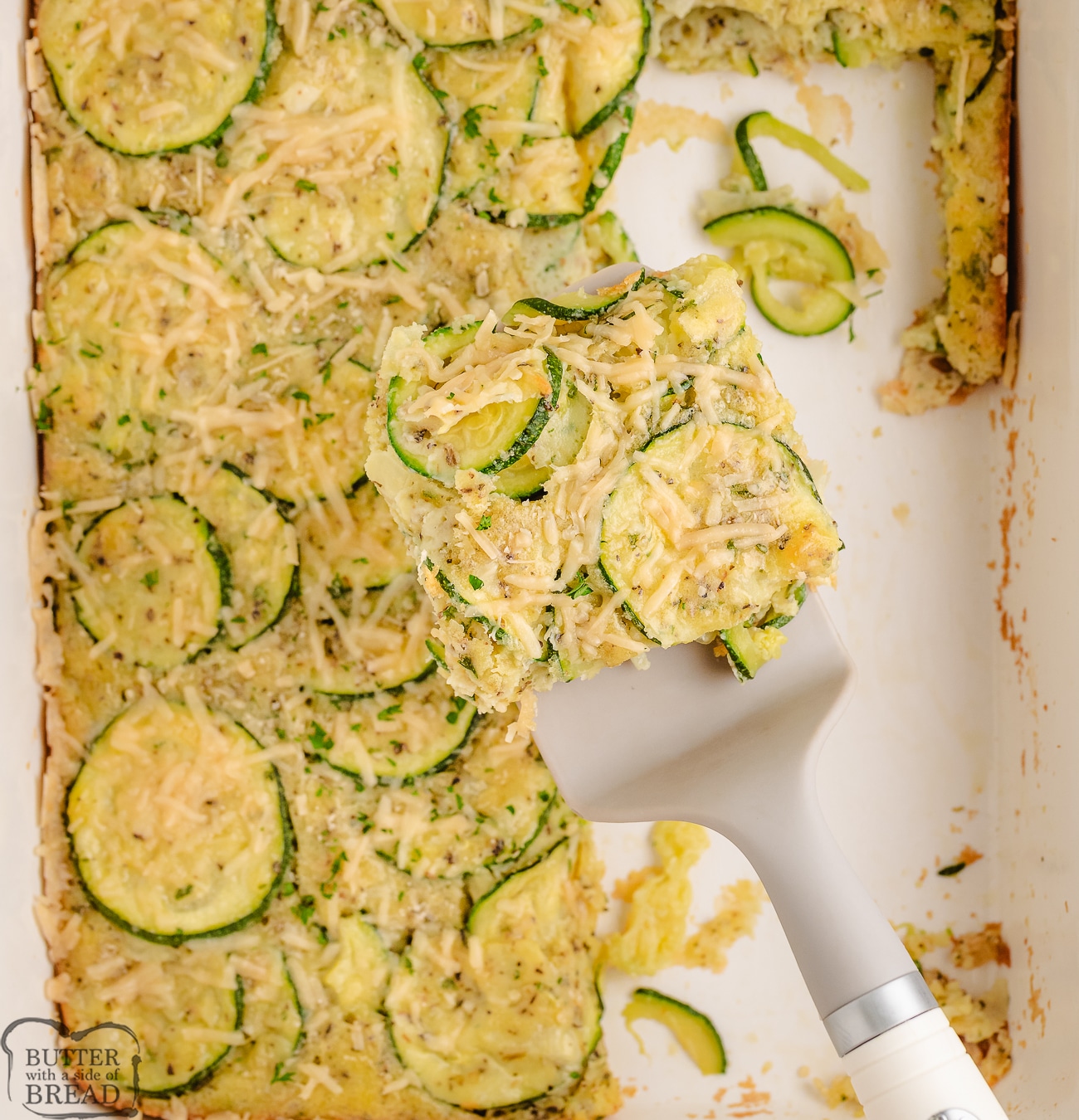 scooping up some zucchini casserole