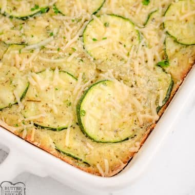 baked zucchini Parmesan casserole in a white baking dish