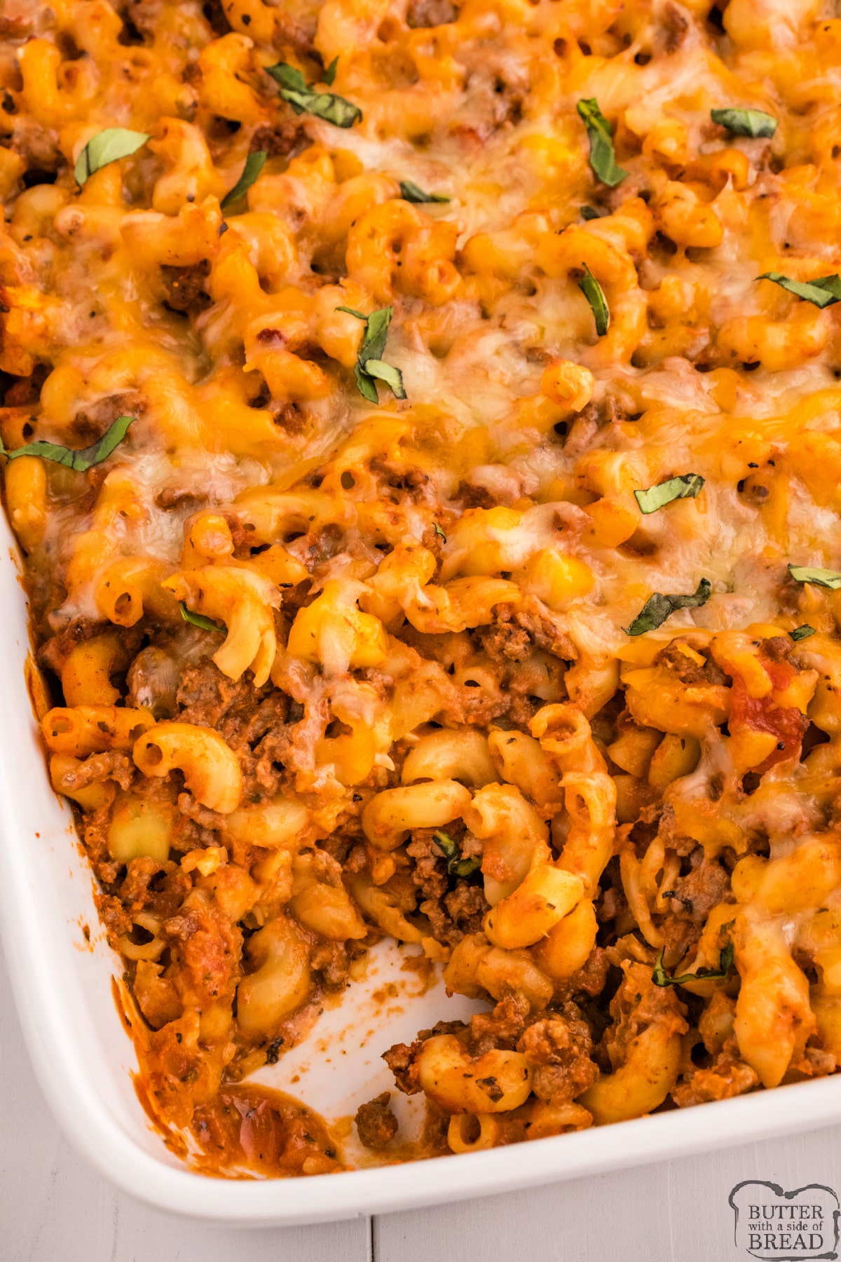 Cheesy Beef & Zucchini Casserole is a delicious one-dish meal that the whole family will love. Made with fresh zucchini, ground beef, macaroni noodles, marinara sauce, cheese and lots of spices! 