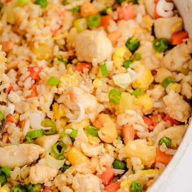 pan of fried rice with chicken and pineapple