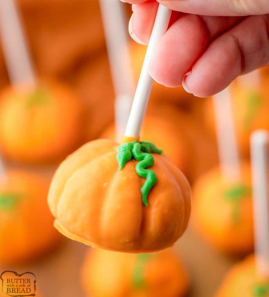holding a pumpkin Oreo Ball