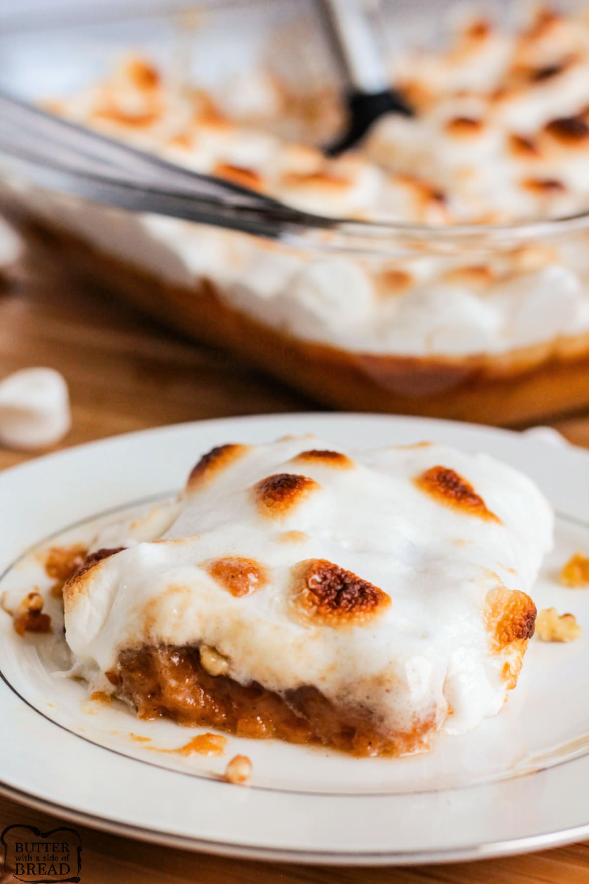This classic Sweet Potato Casserole is the best version we've ever tried! Made with canned yams and marshmallows on top, this baked casserole is perfect for Thanksgiving dinner. 