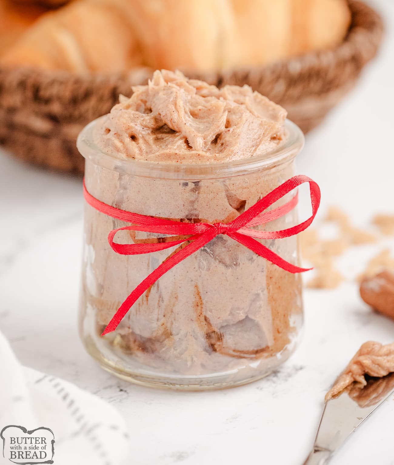 brown sugar butter in a jar with a red bow
