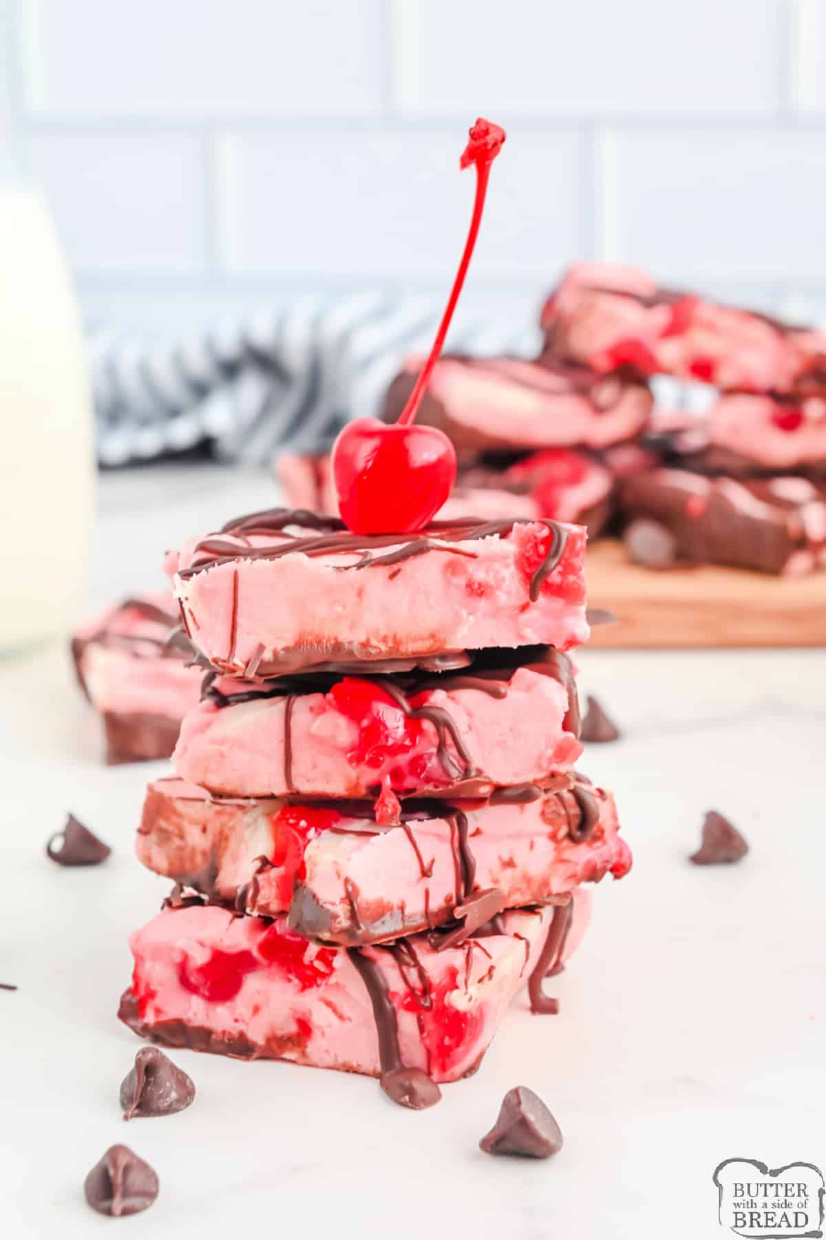 Cherry Garcia Fudge is rich, creamy and packed with cherries and chocolate! Delicious fudge recipe made with maraschino cherries, marshmallow cream, white chocolate chips and semi-sweet chocolate.