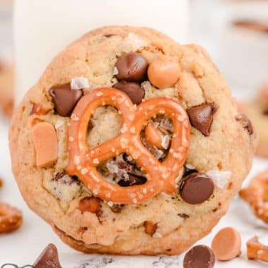 chocolate chip butterscotch cookies topped with a pretzel