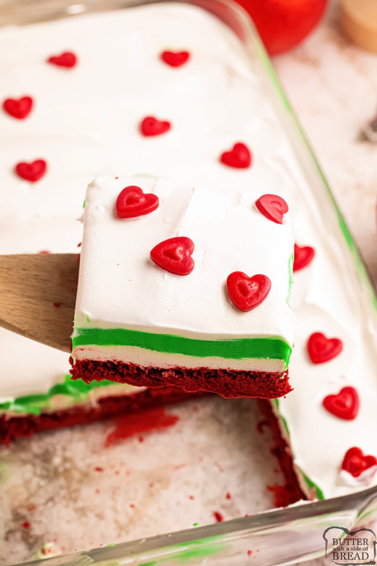 Piece of red, white and green dessert recipe. 