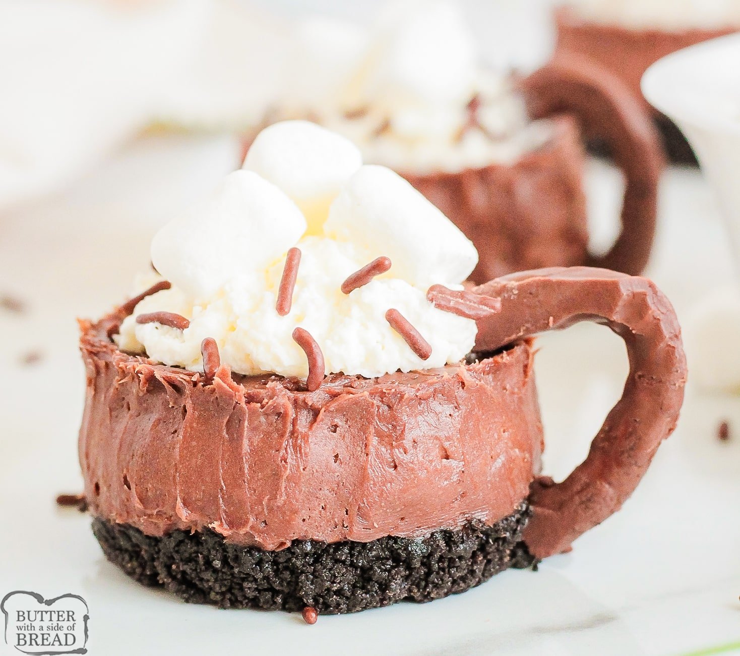 mini hot chocolate cheesecakes with chocolate handles
