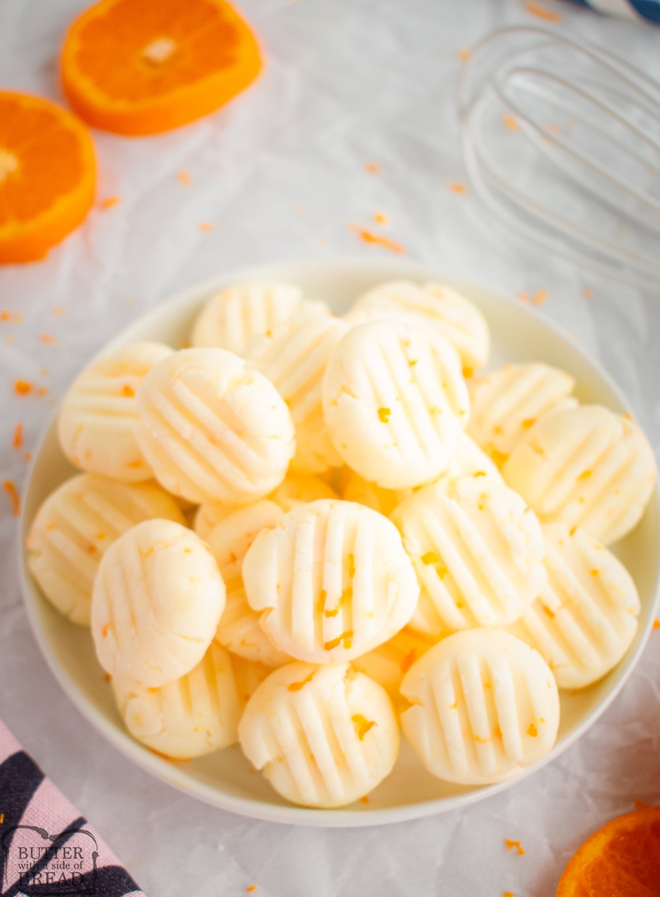 orange cream cheese mints in a bowl
