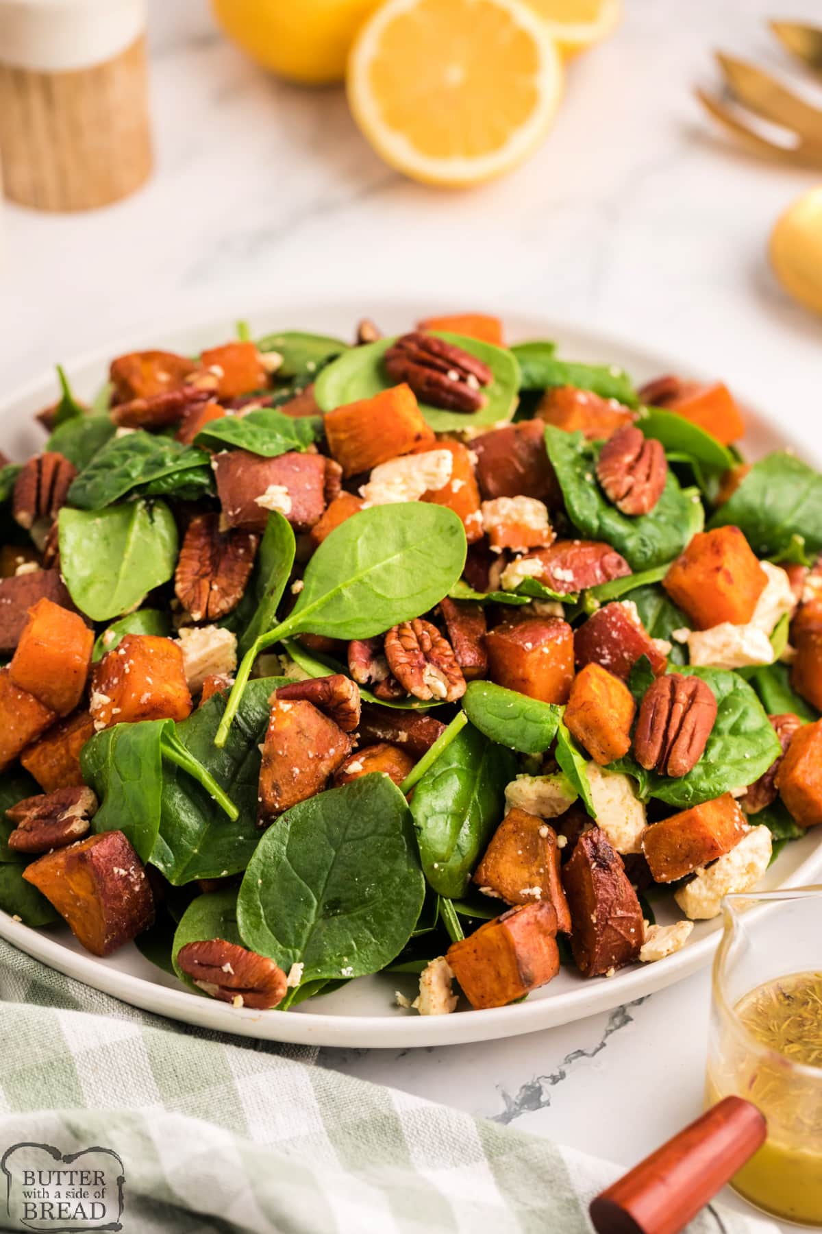 Roasted Sweet Potato Salad is made with sweet potatoes that have been coated in cinnamon and brown sugar and then roasted to perfection. This delicious salad recipe is simple enough to enjoy regularly, and fancy enough to serve at an elegant dinner! 