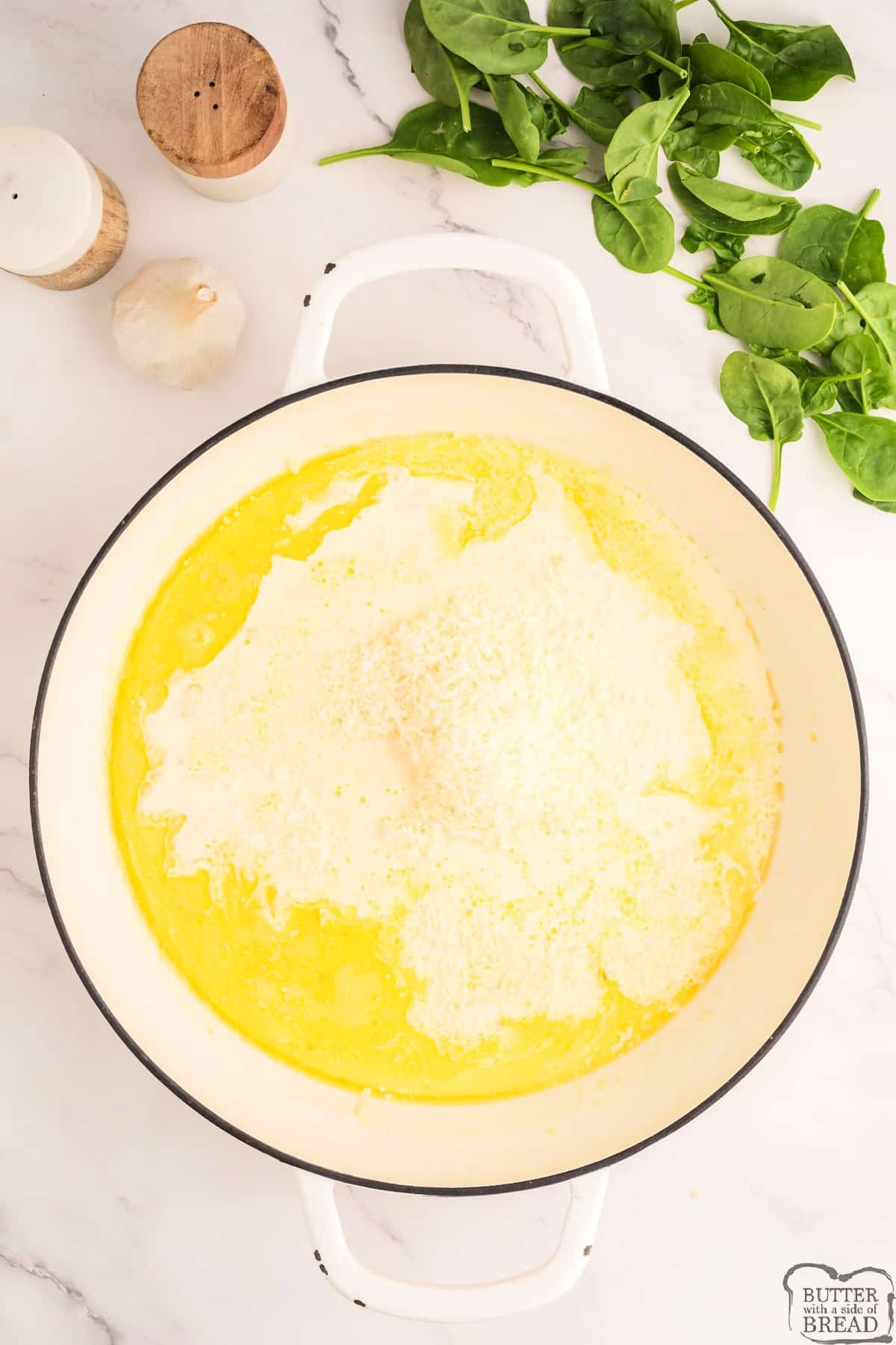 Add cream and parmesan to alfredo sauce recipe. 
