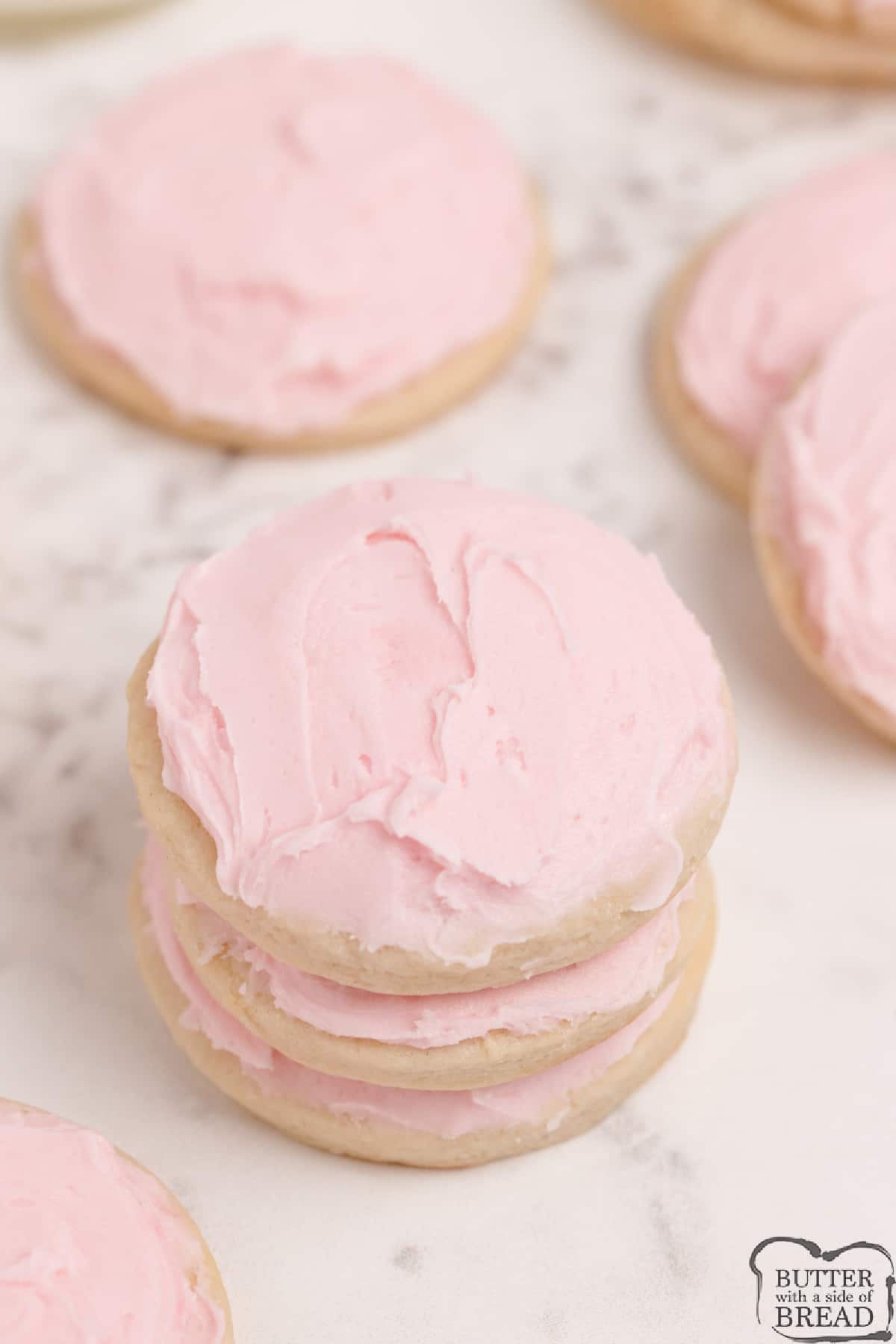 Sugar cookies with pink frosting. 