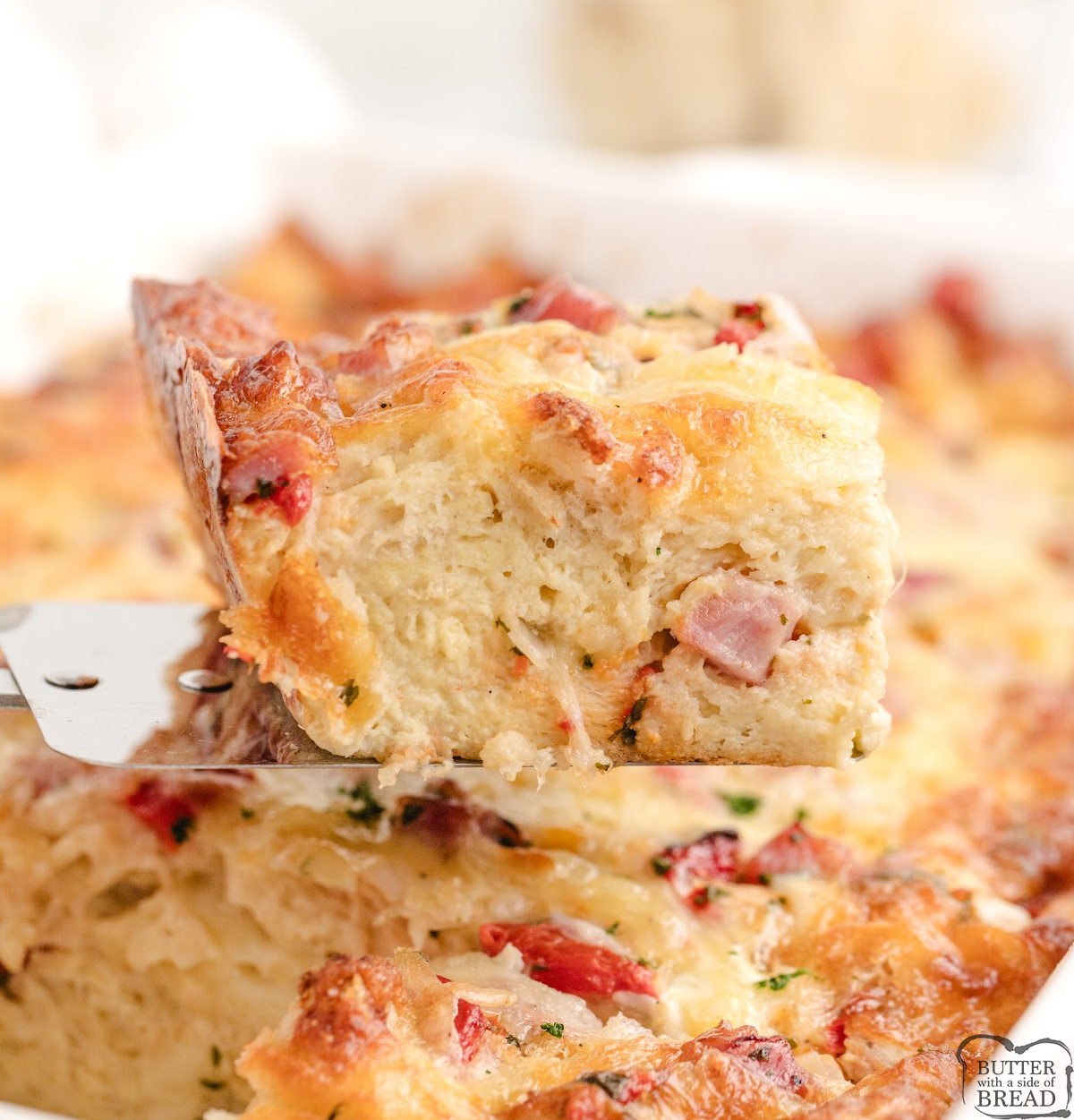 Easy overnight Ham and Cheese Breakfast Casserole with sourdough, ham, peppers, and Gouda&mdash;perfect make ahead recipe for Christmas morning.