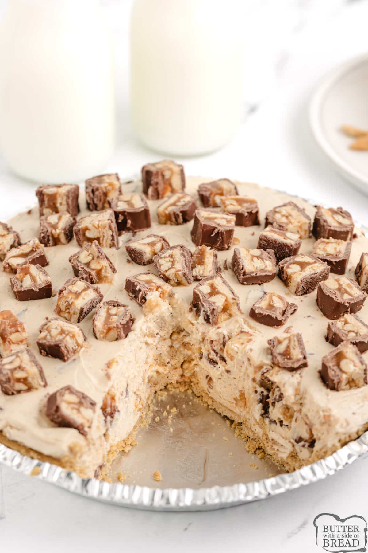No Bake Snickers Pie is made with 6 ingredients in less than 5 minutes of prep time. Deliciously creamy no bake peanut butter pie recipe!