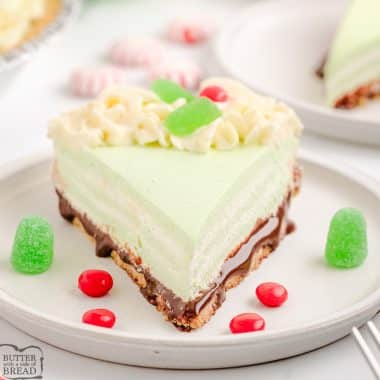 slice of layered green peppermint cream pie on a plate