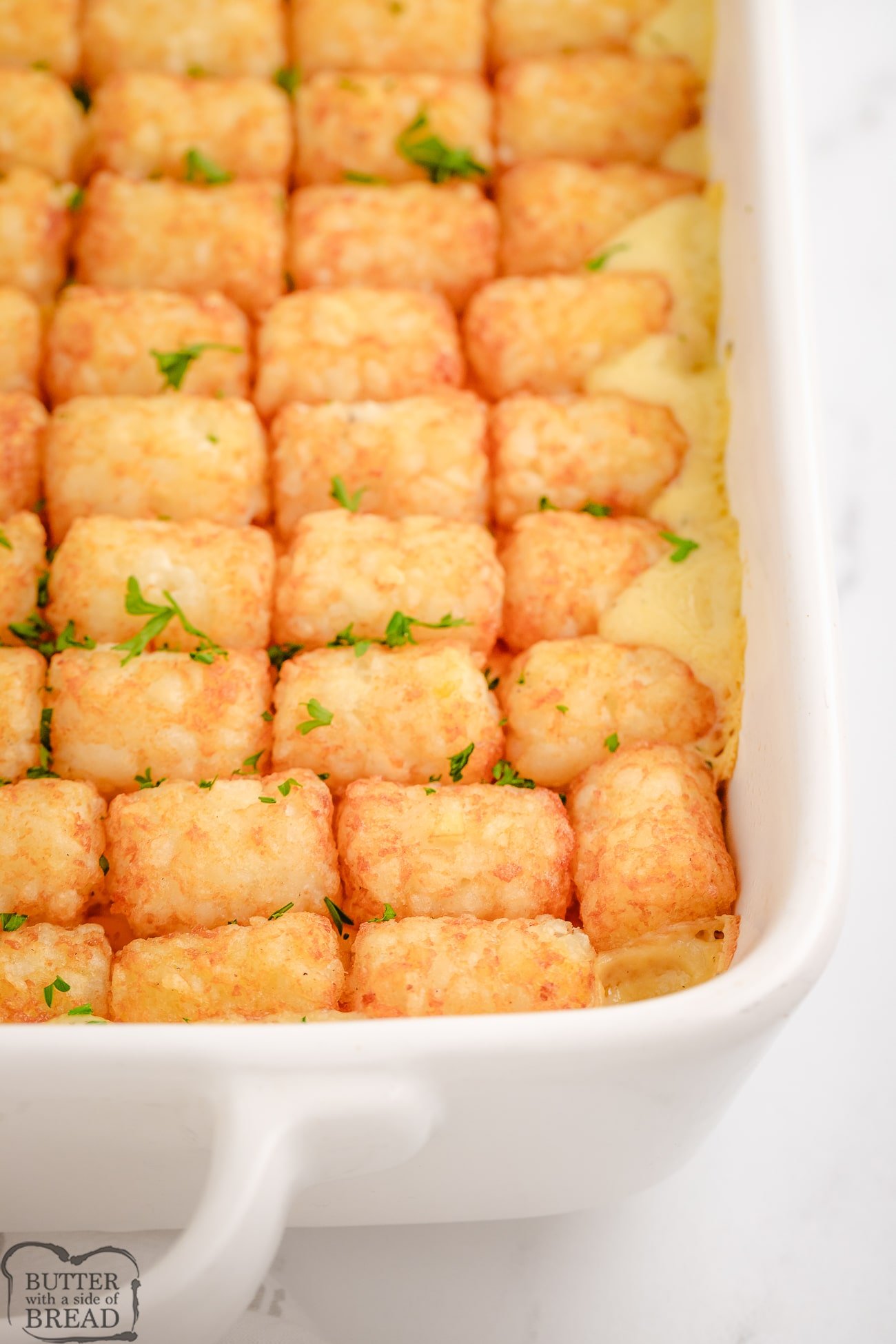 Ranch chicken tater tot casserole in a white baking dish