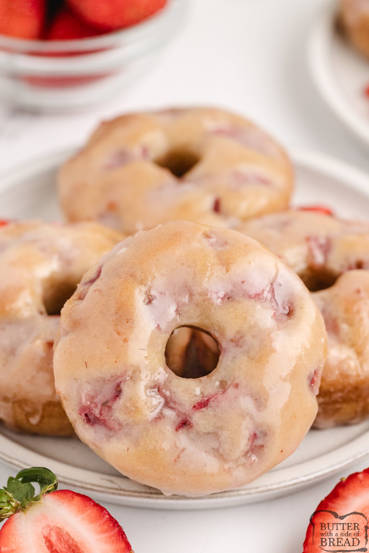 Baked Strawberry Donuts are made completely from scratch with fresh strawberries and a simple strawberry glaze. 