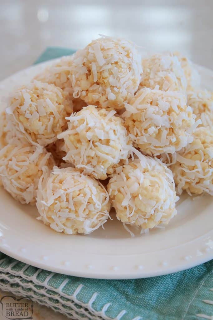 rice krispie coconut snowballs on a white plate