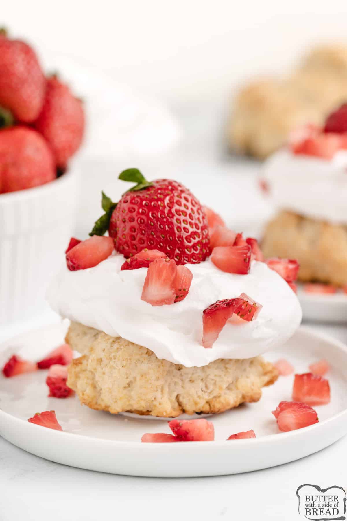 Mini Strawberry Shortcakes are made from scratch with a few basic ingredients. Perfectly portioned dessert made with fresh strawberries and whipped cream. 