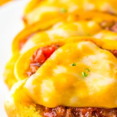 sloppy joes on garlic Texas toast topped with melted cheese