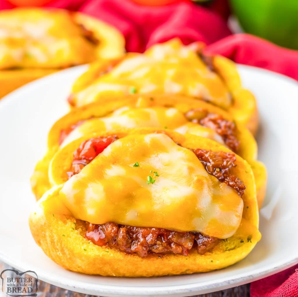 texas toast sloppy joes on a white plate