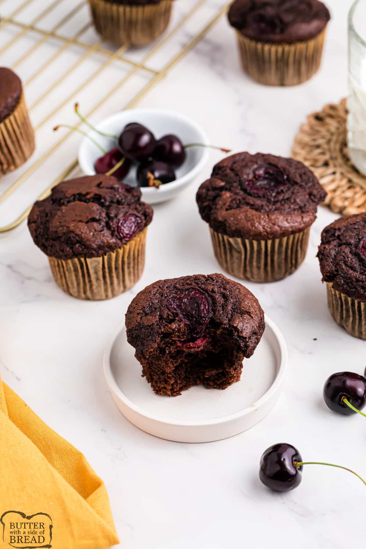 Cherry Chocolate Muffins are made with sweet and juicy fresh cherries. Deliciously moist bakery-style muffins that are perfect for breakfast or dessert!