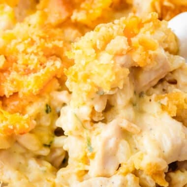 scooping up chicken and rice casserole