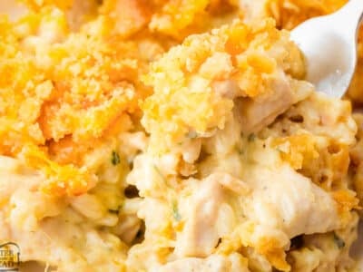 scooping up chicken and rice casserole