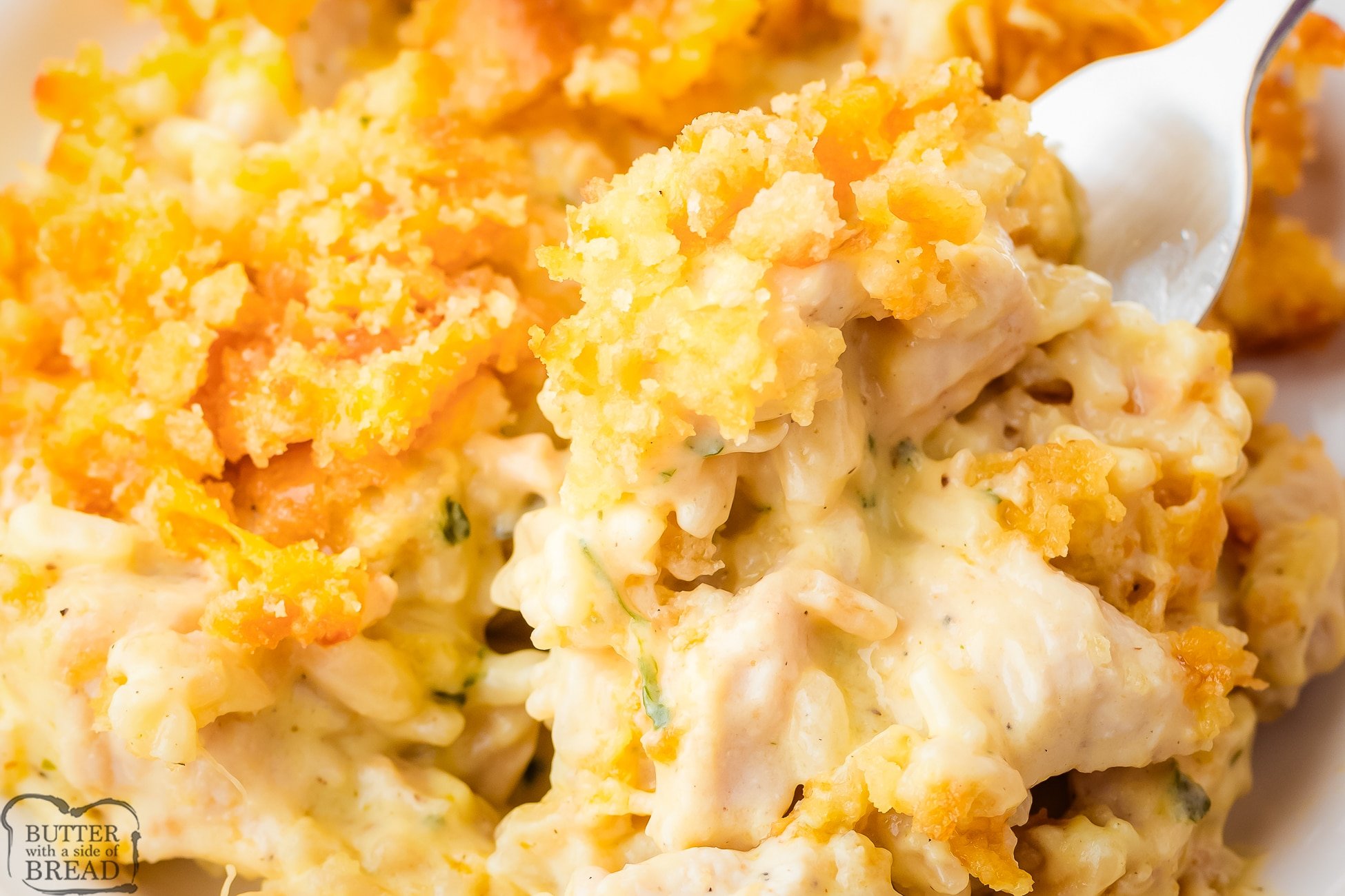 scooping up chicken and rice casserole