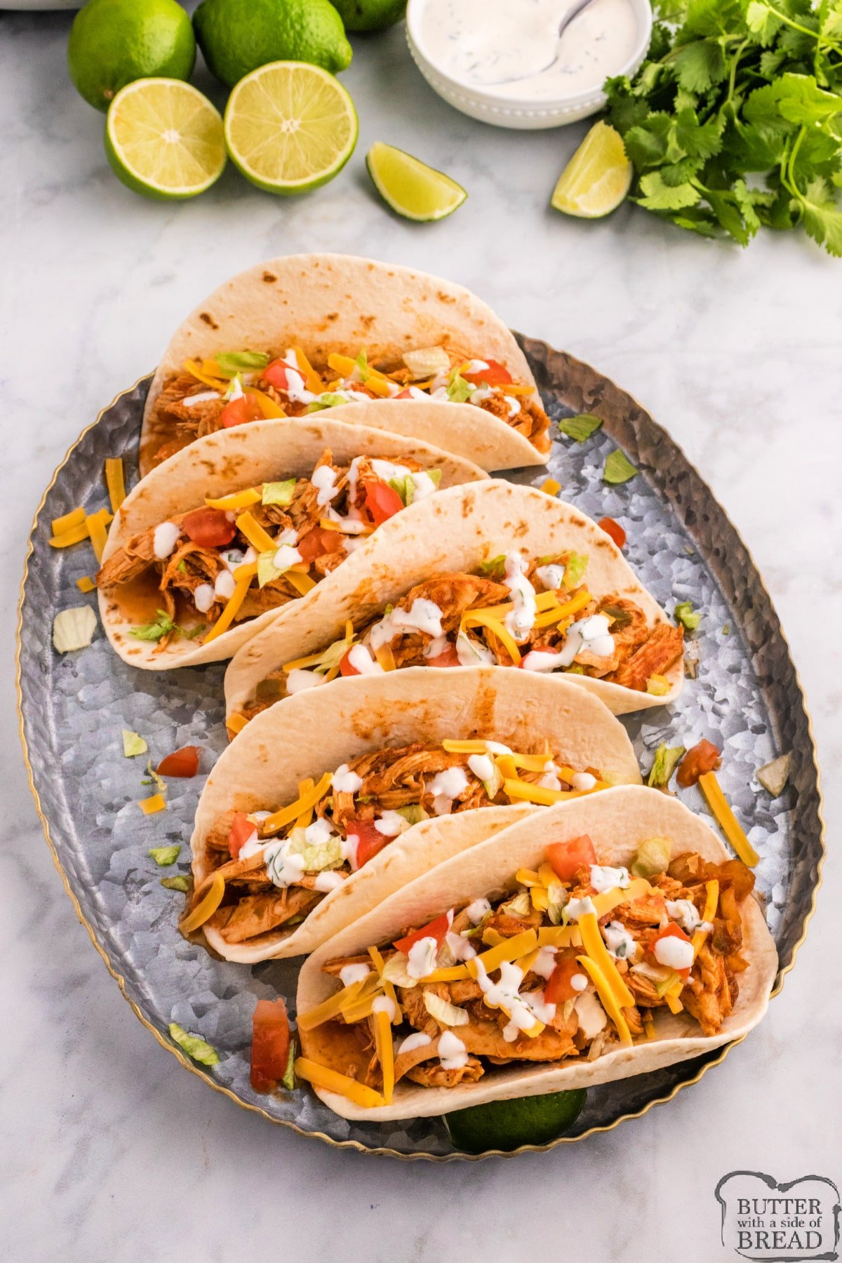 Tacos made with slow cooker chicken. 