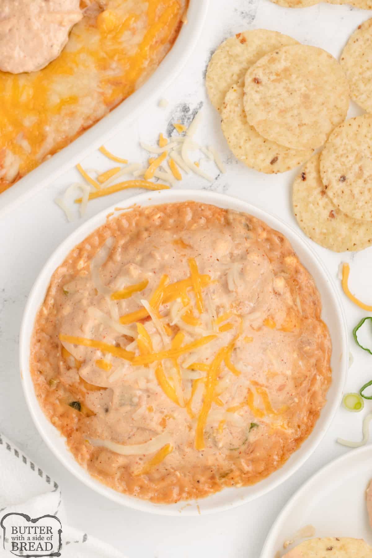 Bean dip made with cream cheese, sour cream, refried beans, and cheddar cheese. 