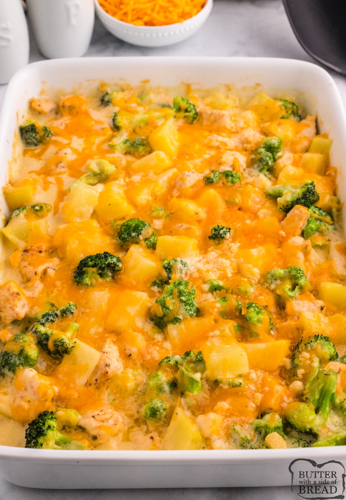 Cheesy chicken casserole with potatoes and broccoli. 