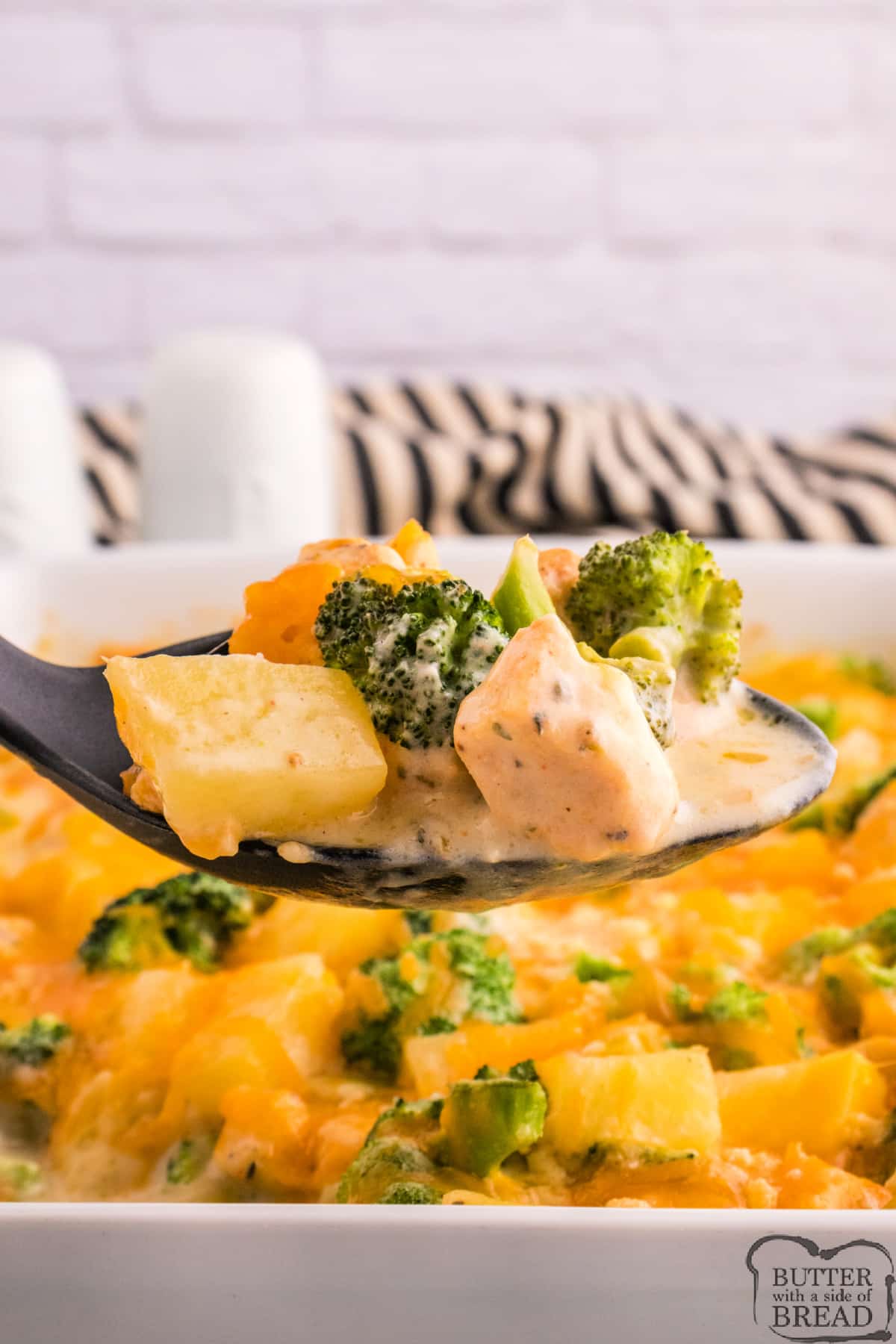 Chicken, potatoes, broccoli, and cheese. 