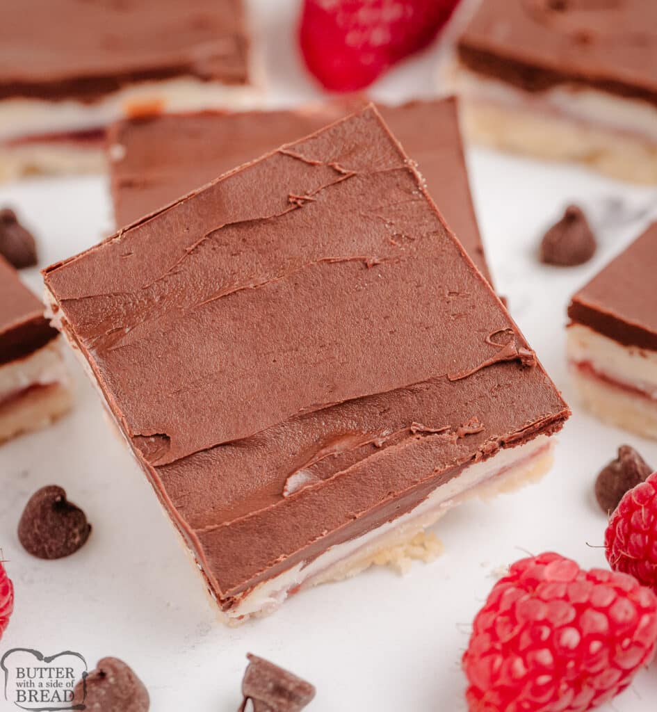 square of chocolate raspberry cheesecake bars